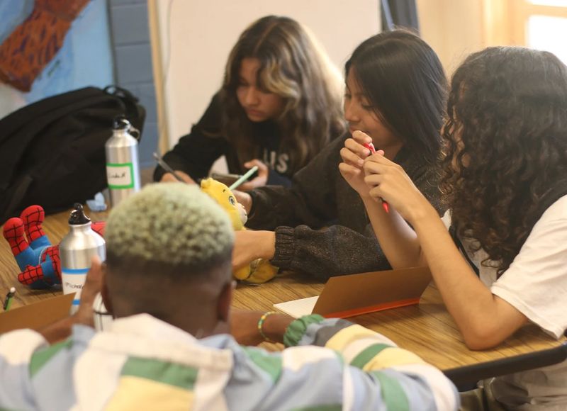 Participants talking in a small group session