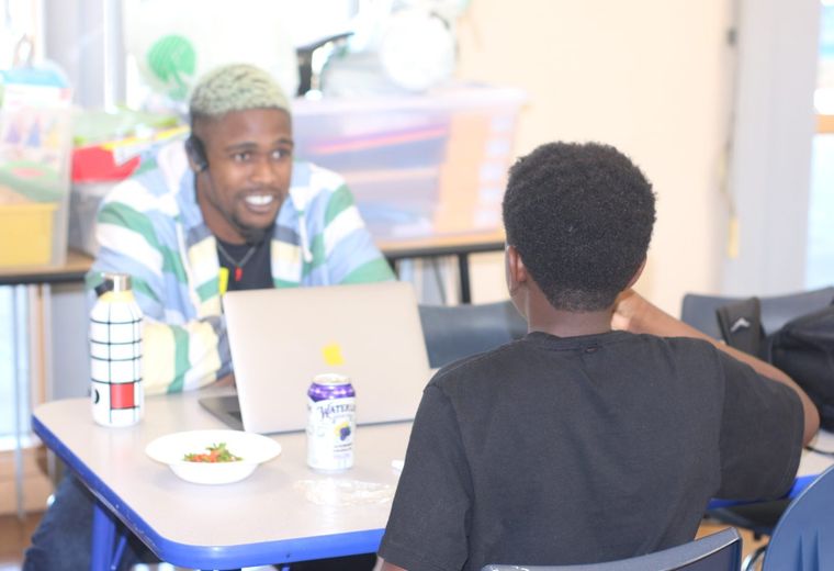 Facilitators collaborating during a training session